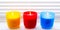 Bright colorful candles. Scented colorful candles with lighted wicks