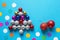 Bright colorful Christmas balls. Christmas balls in form of fir-tree. Flat lay, free space for text