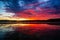 Bright colorful foggy sunset on the lake with clouds and reflections in Finland. Nature amazing sunrise background