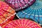 Bright colorful handmade ethnic traditional pillows background selling on a local asian market