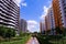 Bright colorful HDB flats buildings in Singapore, against cloudy blue sky. Panoramic view