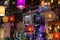 Bright, colorful lights hang in an electrical store