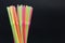 Bright colorful plastic straws line pattern artistic design