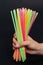 Bright colorful plastic straws line pattern artistic design