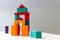 Bright colorful wooden blocks toy. Bricks children building tower, castle.