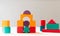 Bright colorful wooden blocks toy. Bricks children building tower, castle, house