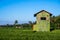 Bright coloured house on a rice terrace