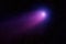 Bright comet on a dark background. Elements of this image furnished by NASA