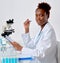 Bright, confident young African woman in lab coat inerrupted her