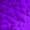 Bright contrasting violet fragments of crystals on triangles of irregular shape