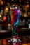 Bright cosmic cocktail in tall glass on bar top, with colorful turbulence, AI generated