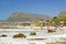 Bright Crayon-Colored Beach Huts at St James, False Bay on Indian Ocean, outside of Cape Town, South Africa