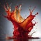 A bright, dynamic splash of red liquid captured in motion and bathed in warm