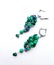 Bright earrings made of natural stones on a white background. Natural malachite and lapis lazuli.