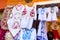 Bright ethnic shirts and tablecloths with traditional Hungarian embroidery in a street store