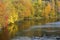 Bright fall colors reflect on the Farmington River, Canton, Conn