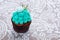 Bright and festive, mint cupcake