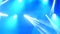 Bright flashing concert spotlights lasers and smoke at scene backgroun