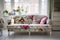 bright floral sofa in shabby chic living room