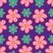 Bright flowers seamless pattern on a purple background. Hippy floral background in 1970s flat cartoon style