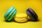 Bright food photography of macroons on yellow