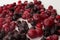 Bright frozen blueberry berries, cherries, cranberries, blueberries full of vitamins for a healthy diet