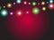 Bright garland lights glowing with various colors. Luminous radiant christmas holiday light decorations. Colorful xmas illuminati