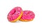 Bright glazed doughnuts with strawberry frosting