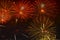 Bright golden glowing spheres and flickering stars, fireworks. Elegant background. New Year, Independence Day, all