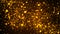 Bright golden sparklers on a dark brown background