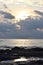 Bright Golden Sunlight coming from behind Dark Clouds over Vast Ocean with Reflection in Puddle - Laxmanpur, Neil Island, Andaman