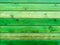 Bright green horizontal painted stained wood cabin wall panel siding