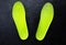 Bright green inner soles of shoes