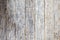 Bright grungy grey wooden floor photo background. Rustic wood plank closeup.