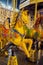Bright horses, colorful carousel, holiday, Christmas market, selective focus