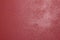 Bright intense light red wine stucco wall from Sicily