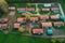 Bright ious pig farm buildings top view. Generative AI