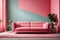 Bright light pink couch near color solid wall in empty living room