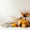 Bright light yellow and white cozy autumn interior decor arrangement, fall home decorations with candles and warm
