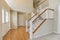 Bright Midwest Foyer with staircase.