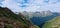 Bright mountain landscape overlooking the valley, gorge, sky and clouds. Panorama HDR