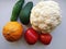 Bright multi-colored vegetables on a white background