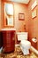 Bright orange bathroom in luxury house