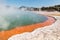 Bright orange coloured Champagne Pool in Waiotapu thermal area near Rotorua, New Zealand