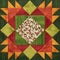 Bright orange-green geometric patchwork block from pieces of fabrics