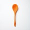 Bright Orange Knitted Spoon: A Minimalistic Still Life Photo