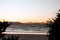 Bright orange sunset sky over Little Wategos Beach in Byron Bay, Australia