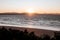 Bright orange sunset sky over Little Wategos Beach in Byron Bay, Australia