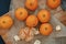 Bright orange tangerines clementines on a wooden background wi