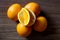 Bright oranges juicy on wooden boards in the kitchen